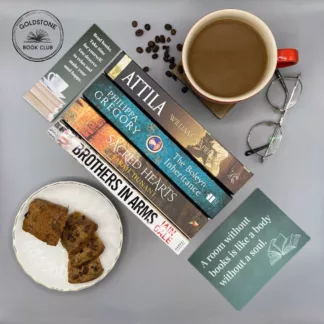 A selection of historical fiction books with an inviting plate of sliced Bara Brith and a delicious cup of coffee
